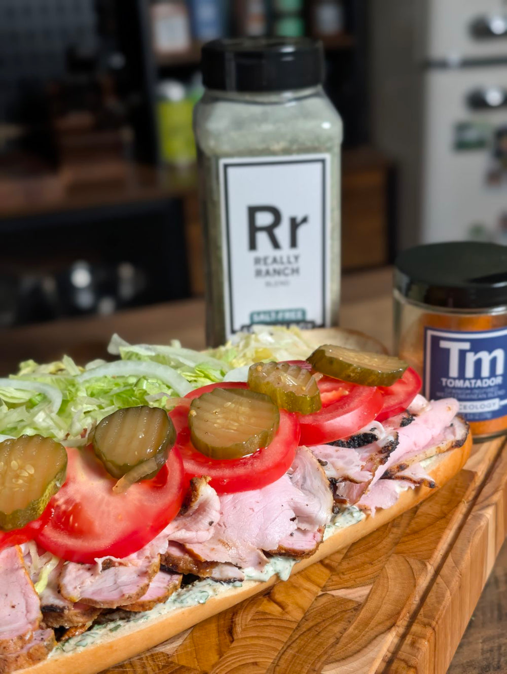 Grilled Tomatador Pork Loin Po' Boy with Really Ranch Remoulade