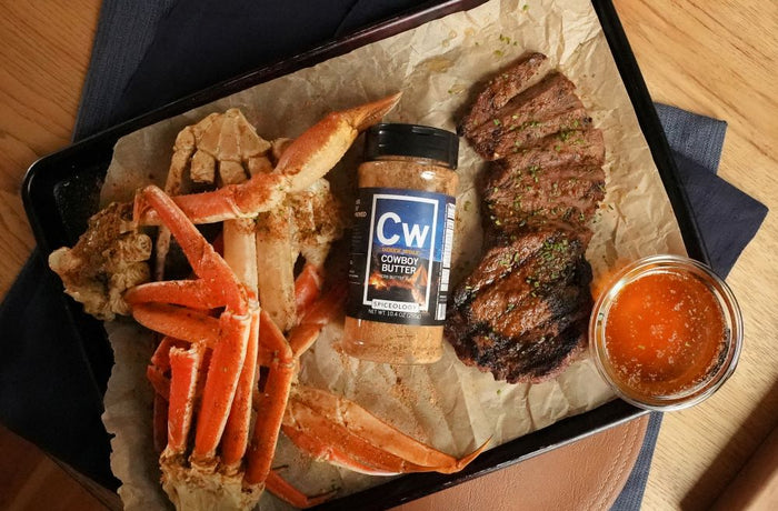 Derek Wolf's Cowboy Butter Surf and Turf recipe featuring grilled steak and seafood with signature compound butter sauce