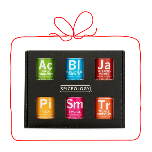 Spiceology gift set graphic featuring six mini spice jars with a red ribbon bow