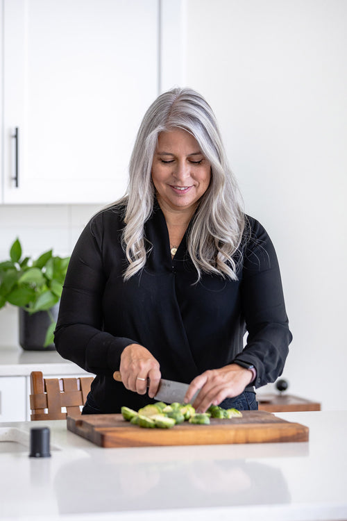 Heather Scholten of Farmgirl Gourmet food blog smiling in professional headshot photo