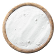 Overhead view of a round container of white powder on a white surface