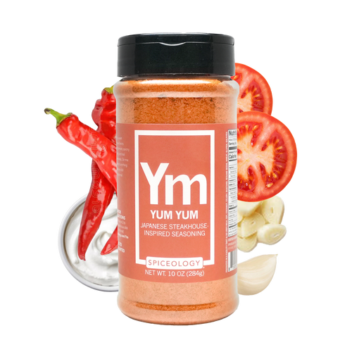 Yum Yum seasoning jar with red peppers, tomatoes, and garlic on a white background